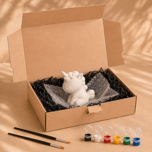 Lieferumfang des Einhorns zum Bemalen mit Farben, Pinseln und Verpackung