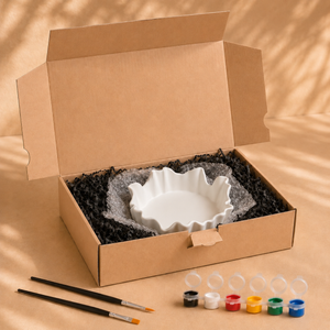 Lieferumfang der Blütenschale zum Bemalen mit Farben, Pinseln und Verpackung